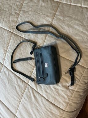 Stone Mountain Accessories blue Crossbody with shoulder and wrist strap